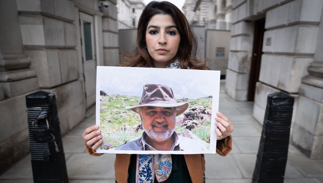 Roxanne Tahbaz holds a picture of her father Morad Tahbaz - one of the American citizens held in Iran barred from leaving the country. Photo: Stefan Rousseau/PA Images via Getty Images