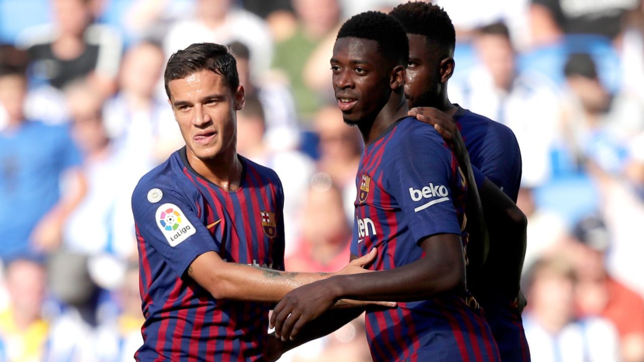 Philippe Coutinho (z lewej) oraz Ousmane Dembele (z prawej, na pierwszym planie) (fot. Getty)